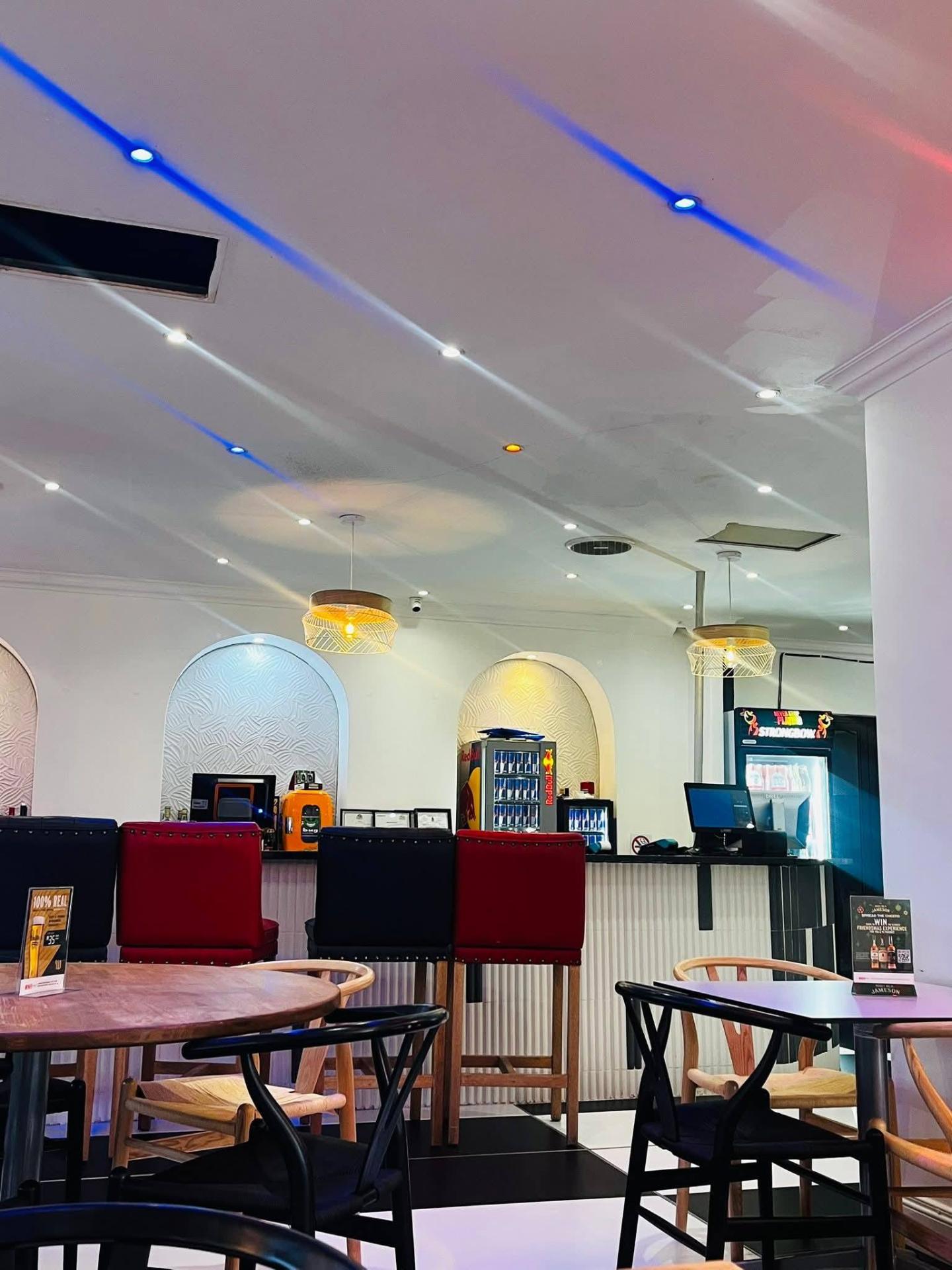 Main bar interior with neon accents